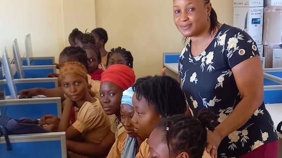 Koumandjan Keita Middle schoolers with Daytocode Guinea Program Manager